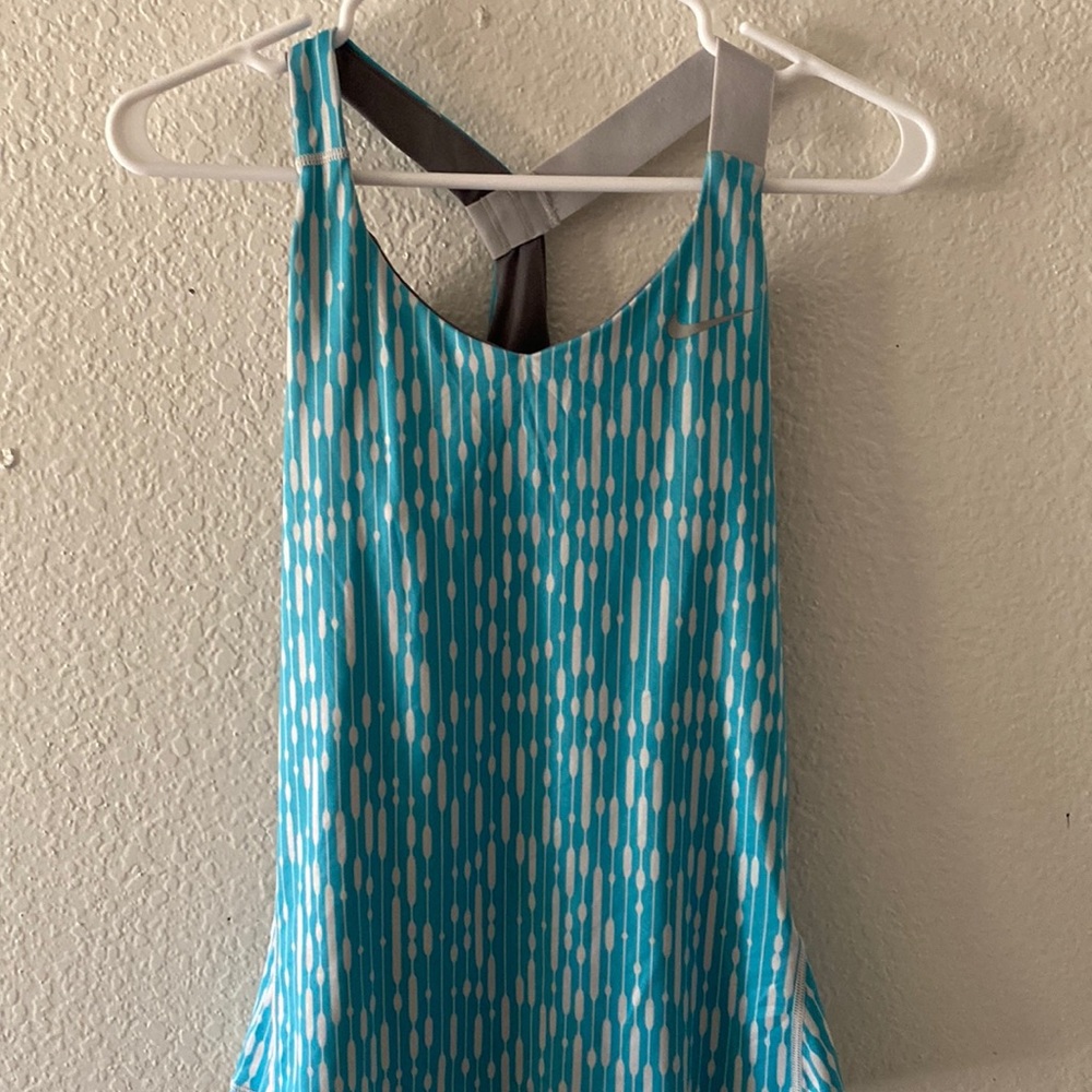 Nike Dry-Fit size XS, blue & white work-out top. Good condition.